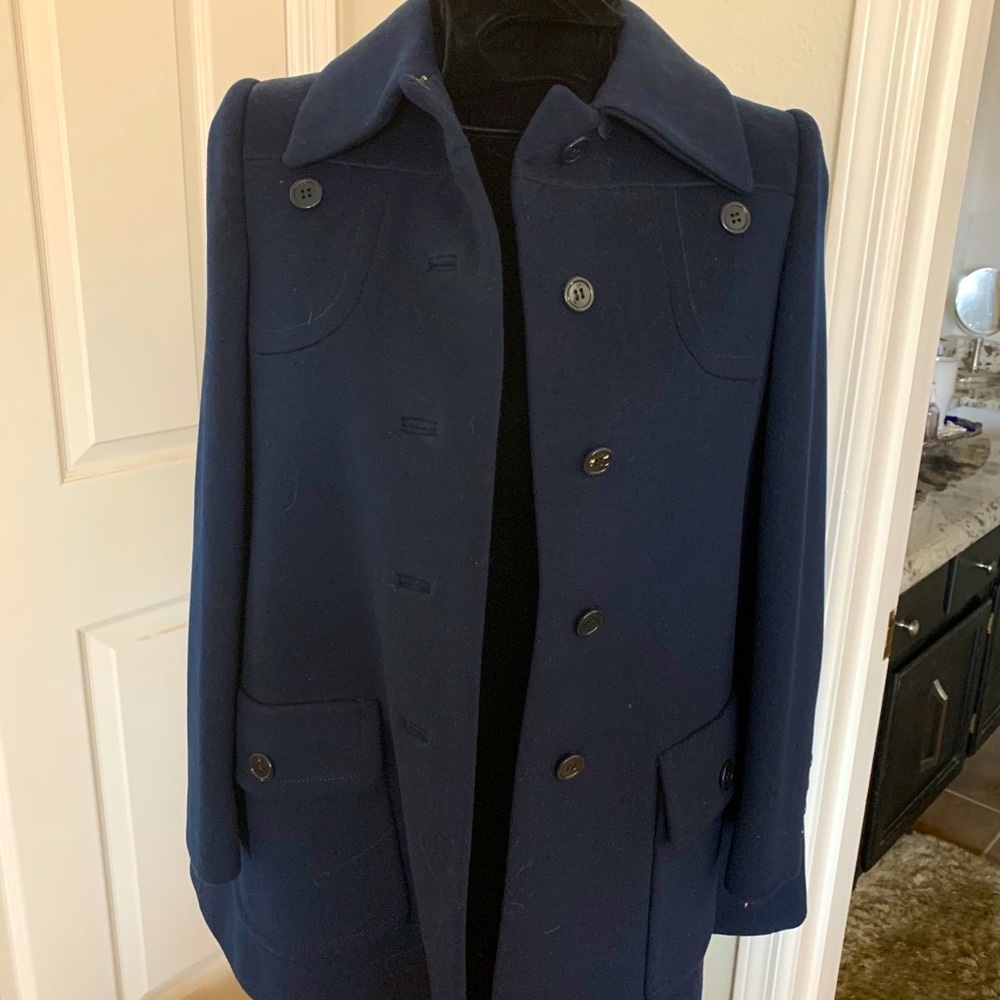 Navy blue wool p coat swing back.